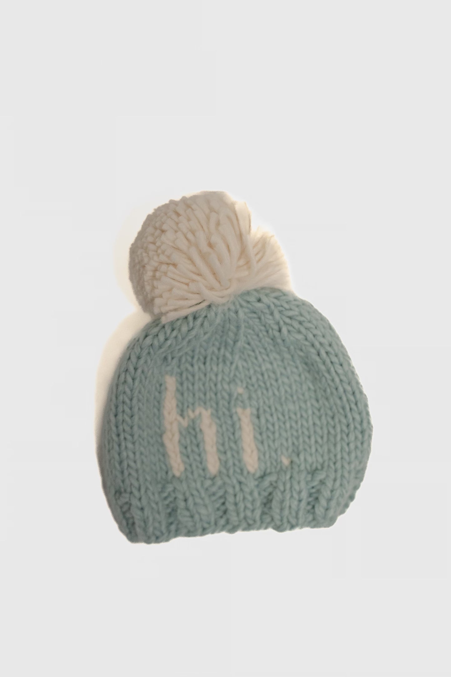 Hi. Sky blue hand knit beanie