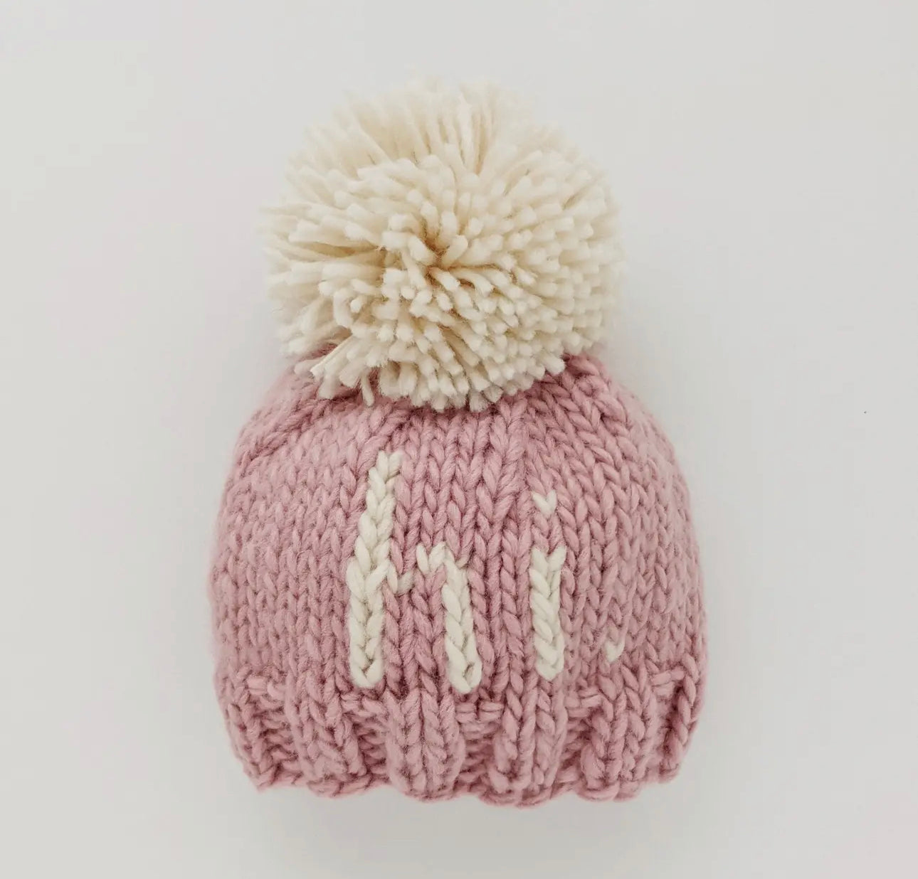 Hi. Rosy pink knitted beanie