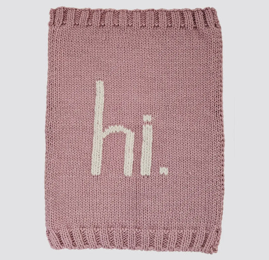 Hi. Rosy pink hand knit blanket